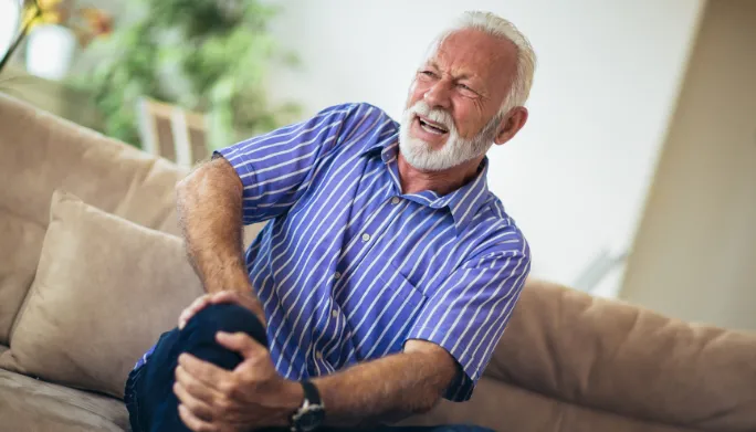 Therapist supporting a patient managing long-term chronic pain