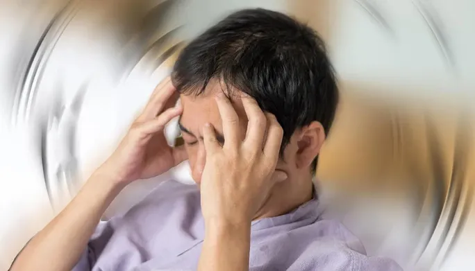 Vestibular therapist treating a patient for dizziness and vertigo
