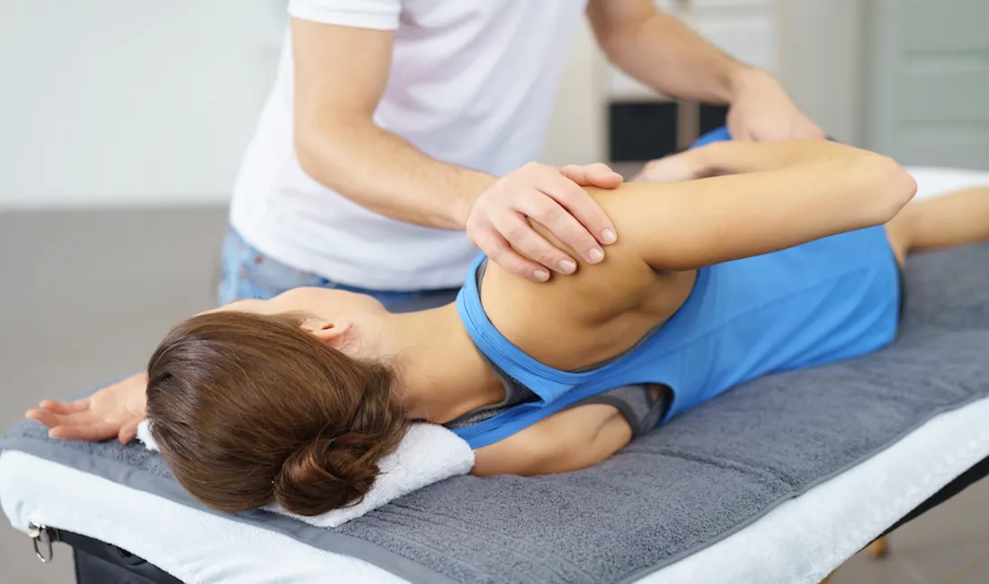 Doctor of Physical Therapy treating the cause of a patient's condition